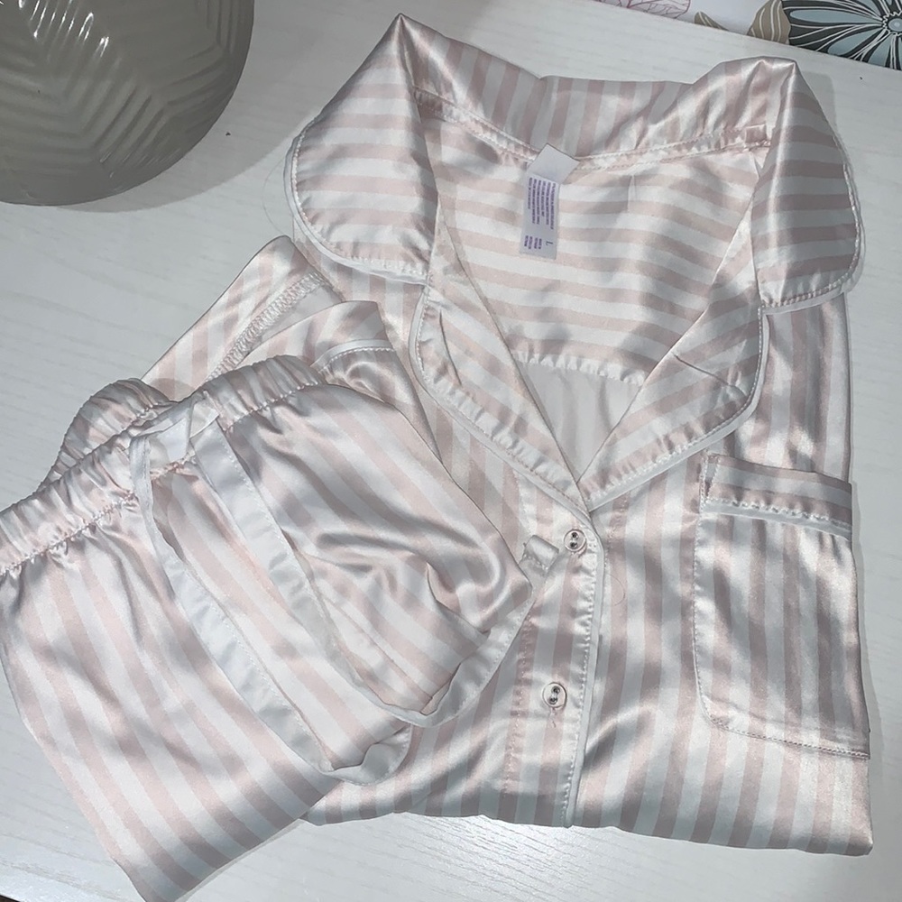 Satin pink white Pajamas like new. Long sleeve top (Large) and shorts (XXL)